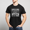 Surviving Fatherhood T Shirt